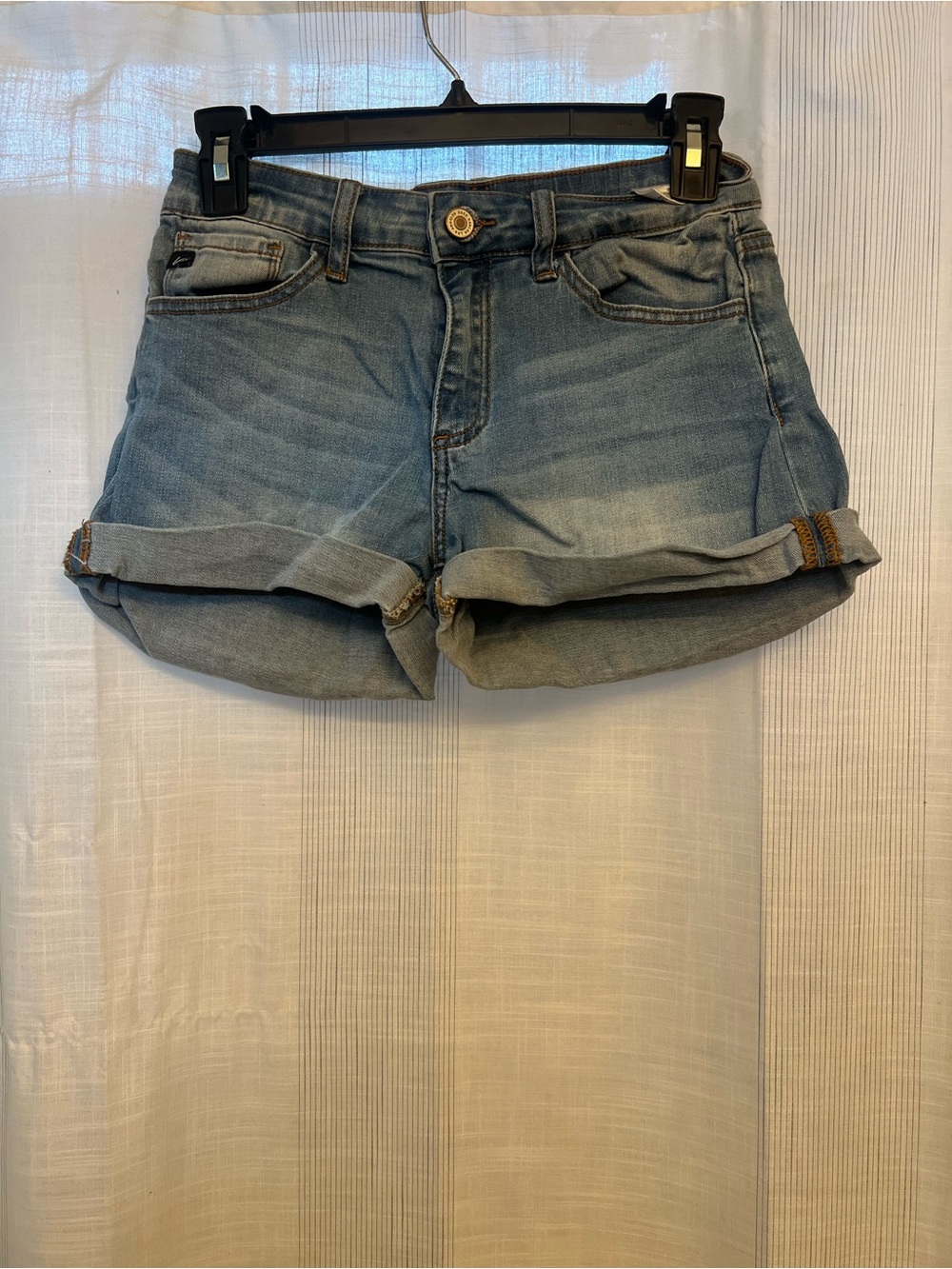 KanCan blue denim shorts with a distressed look